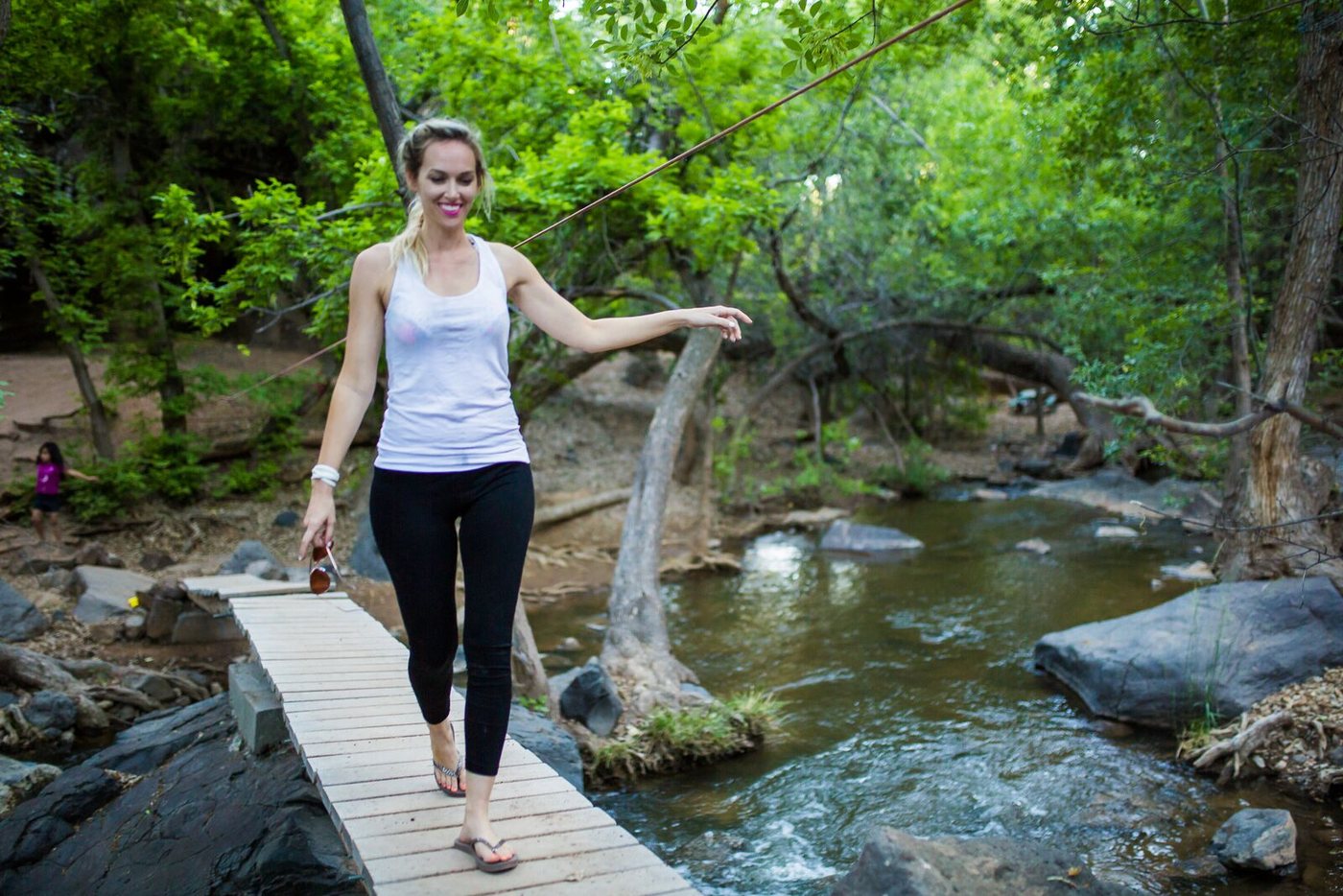 Crossing the log bridge over the creek at Crawdad Canyon